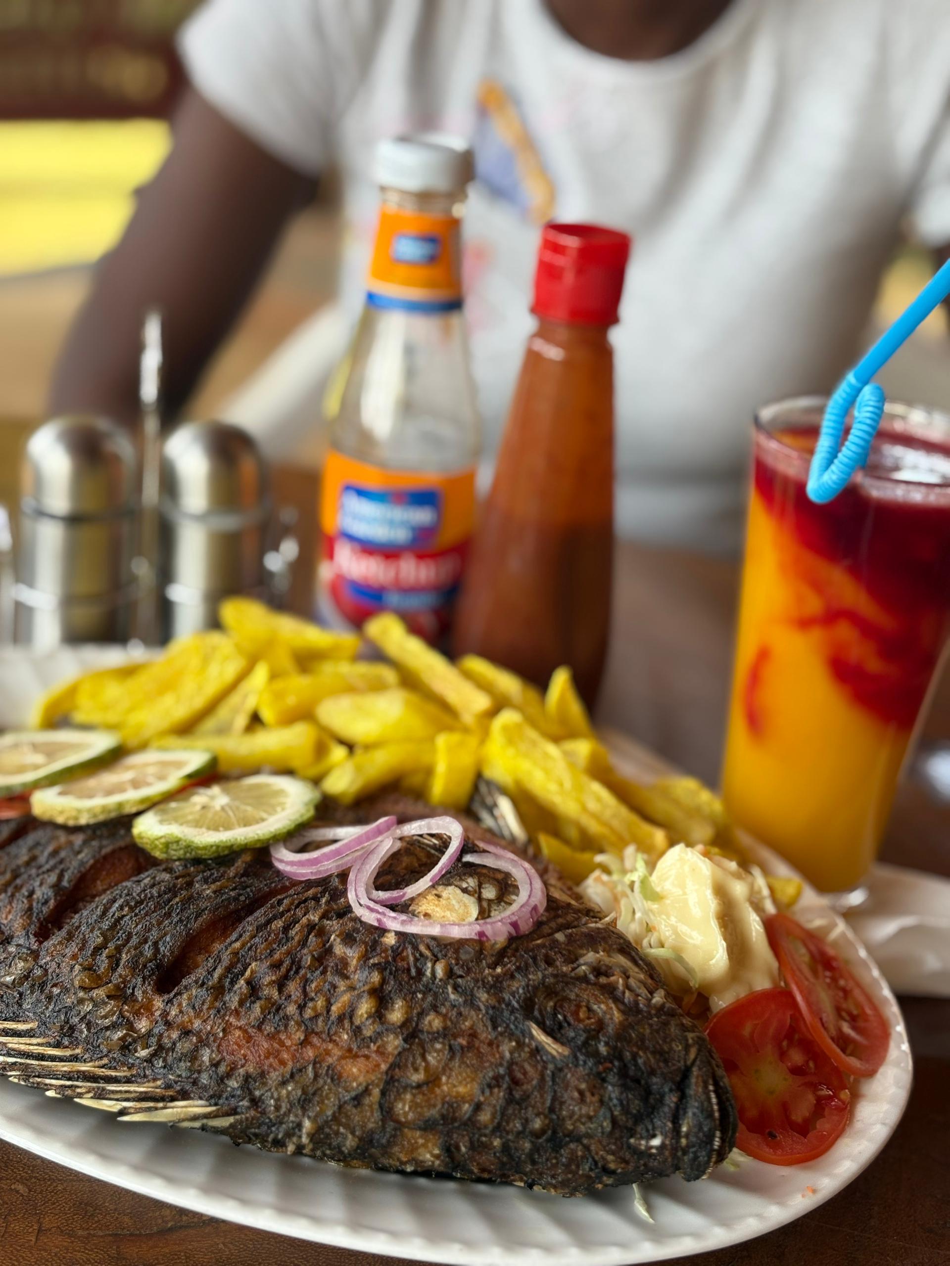 Local Ugandan cuisine at Danma Gardens Restaurant